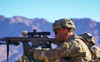 A sniper team provides overwatch. Photo by Maj. Richard Foote